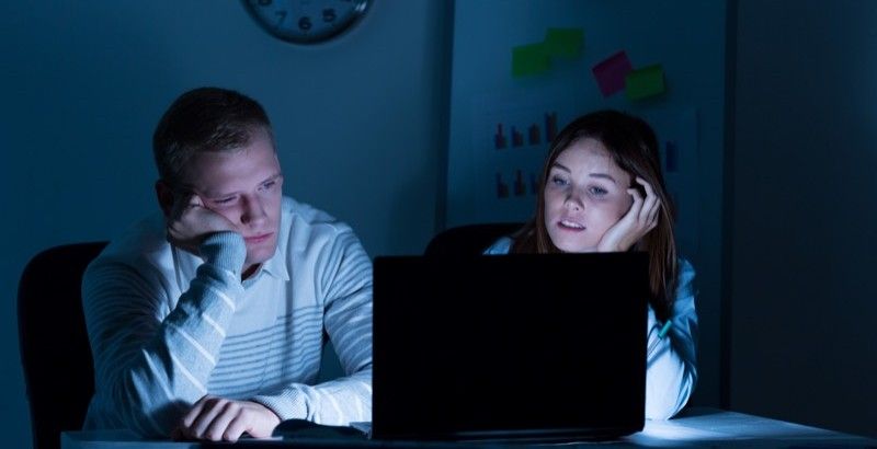Exhausted people work at night